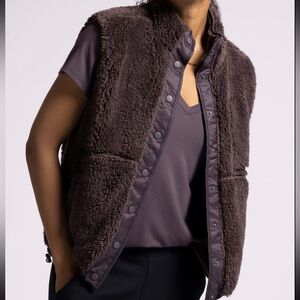 New with tags. Vest w snap closure. Beautiful raisin eggplant color. Multiple sz